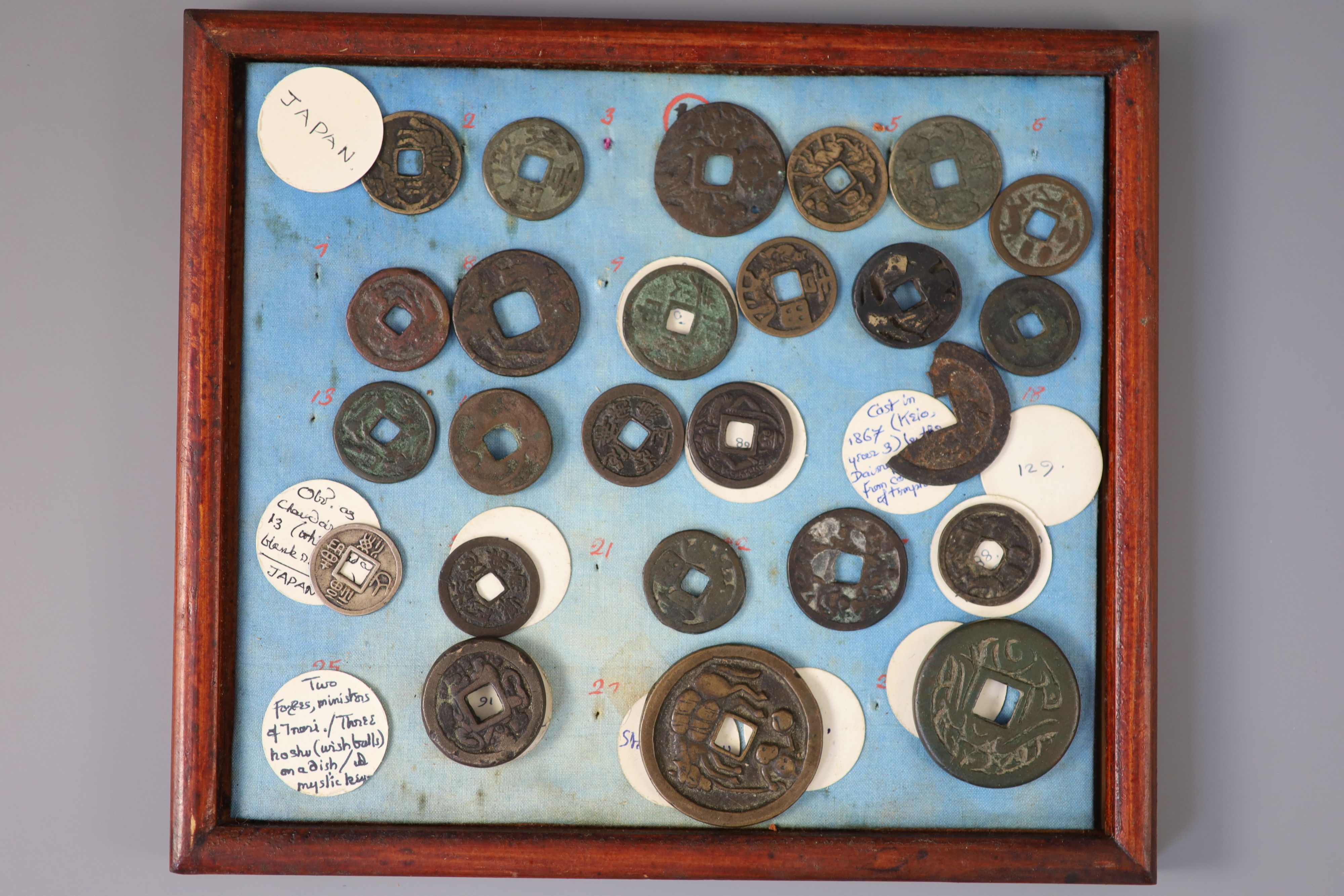 A group of 40 Japanese bronze and metal amulets or charms, 19th/20th century,